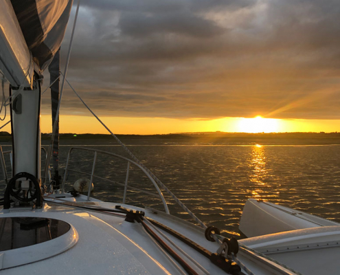 Dragonfly 28 trimaran moored at sunset