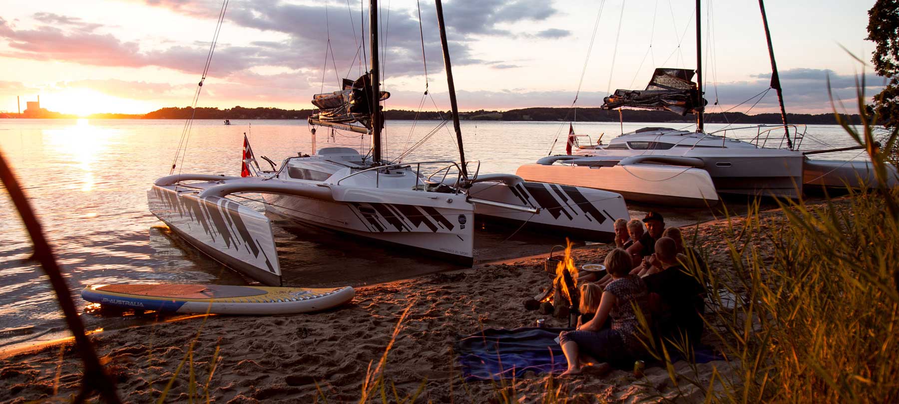 Dragonfly 25 and 28 trimarans at the beach
