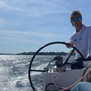 Toby Hodges of Yachting World, helming DF 36 at speed